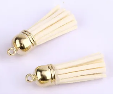 Pompons 38mm en suédine ÉCRU