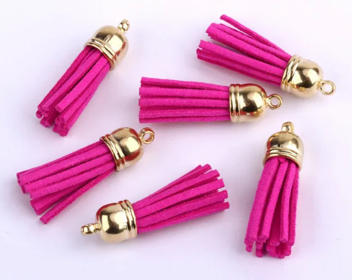 Pompons 38mm en suédine FUSCHIA