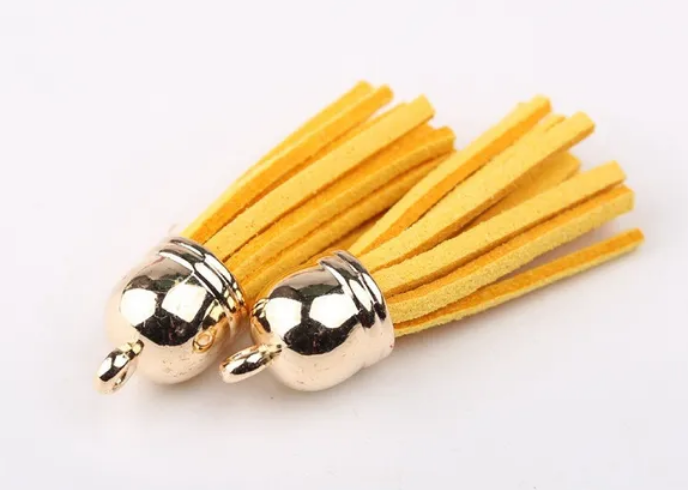 Pompons 38mm en suédine MOUTARDE