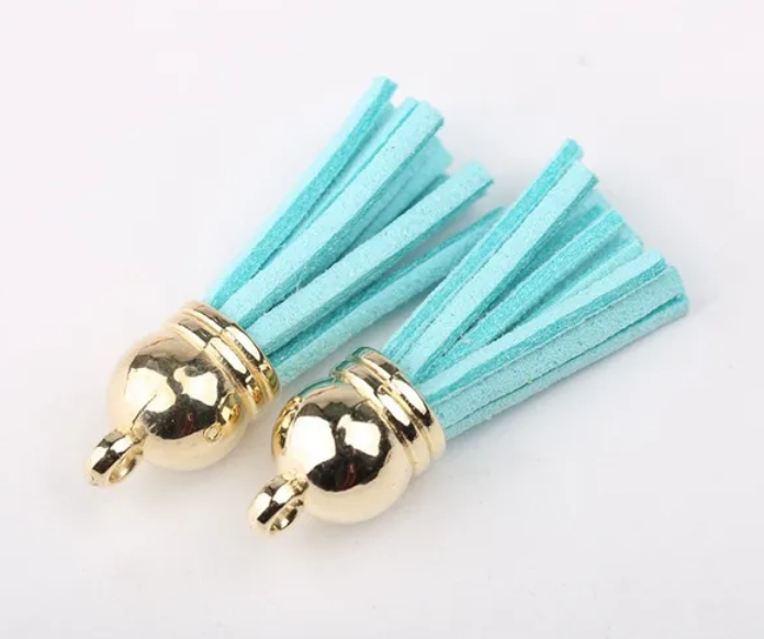 Pompons 38mm en suédine TURQUOISE