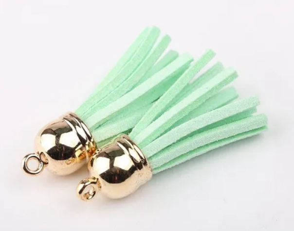 Pompons 38mm en suédine VERT ANIS