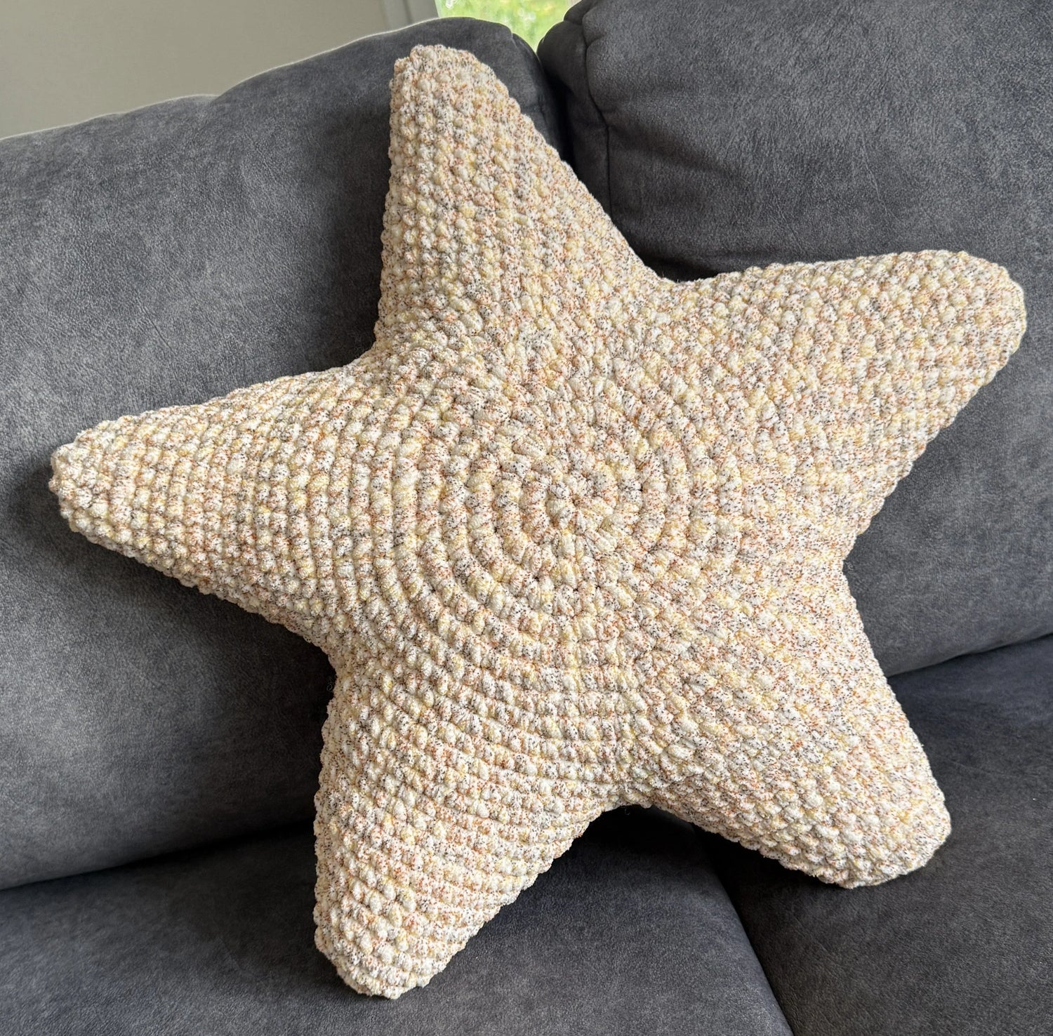 Coussin décoratif en forme d'étoile au crochet